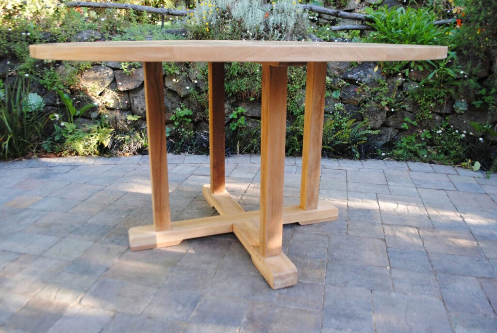 55" Round Fixed Table photo showing quality workmanship of sturdy legs and platform of table Paradise Teak Bay Area California