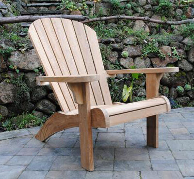 Adirondack Chair made of teak sits on a peaceful patio Paradise Teak Bay Area California