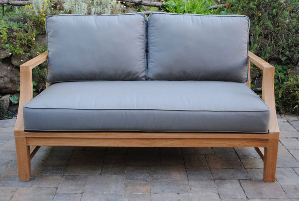 teak Capitola Deep Seating Loveseat with gray Cushions looks comfortable on a patio Paradise Teak Bay Area California