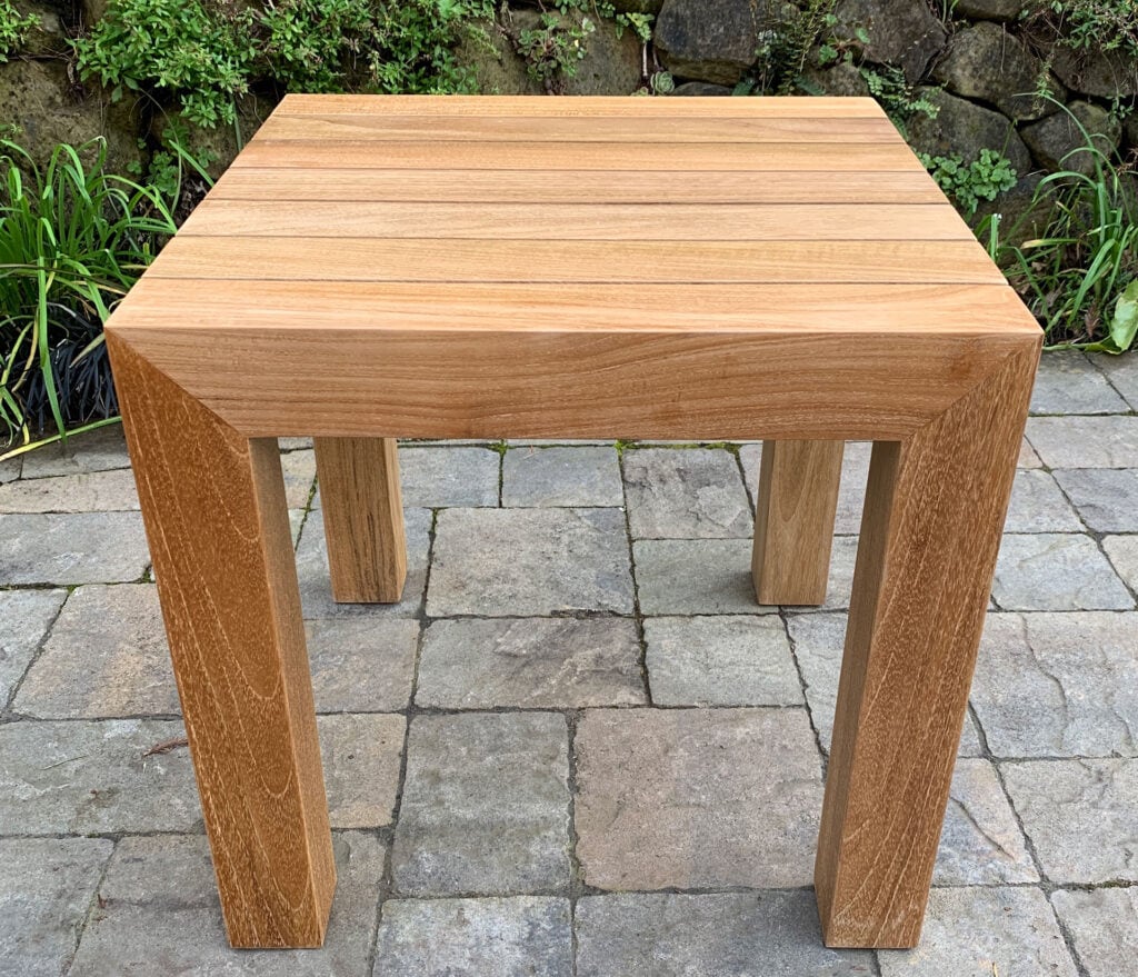 close up of teak Capitola SIde Table has many uses for an outdoor space Paradise Teak Bay Area California