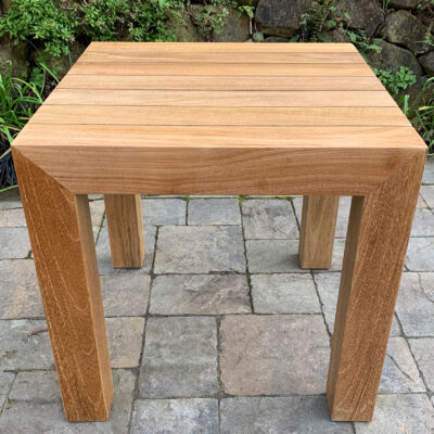 close up of teak Capitola SIde Table has many uses for an outdoor space Paradise Teak Bay Area California
