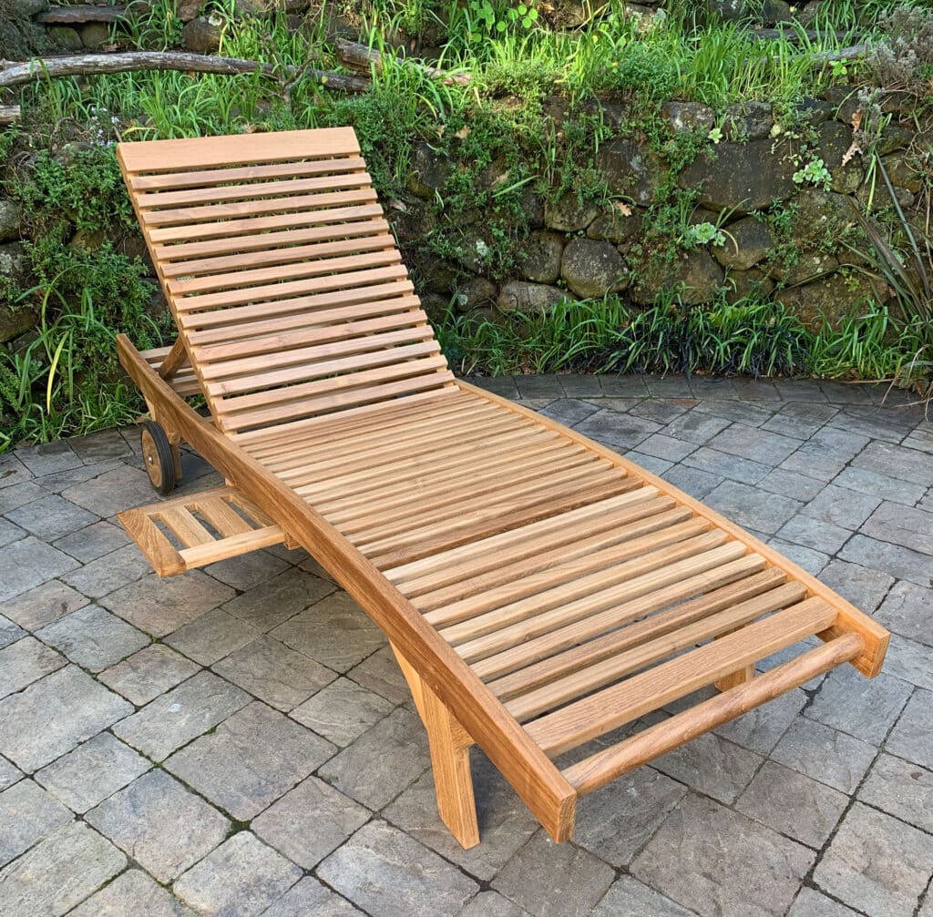 side view of Chaise Sun Lounger made of teak features cup holder and wheels Paradise Teak Bay Area California