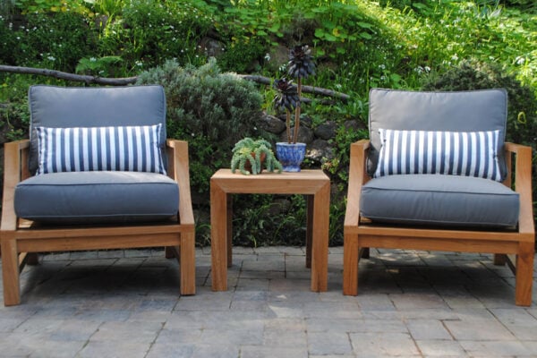2 Deep Seating Chairs with blue cushions and accent pillows with Side Table in the middle Paradise Teak Bay Area California