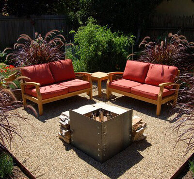 two teak Sonoma Deep Seating Loveseat Next to Firepit and teak side table Paradise Teak Bay Area California